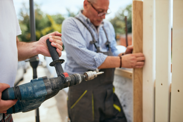 Contractors Fence Installation with power tools